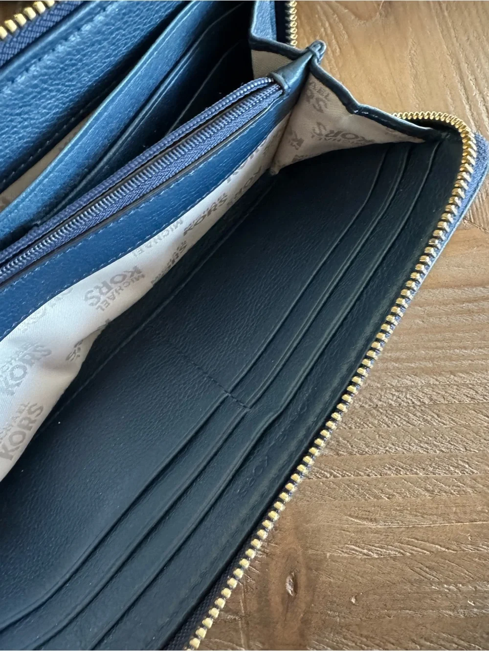 Michael Kors Deep Blue Pebbled Leather Zip Around Wallet with Gold Plate